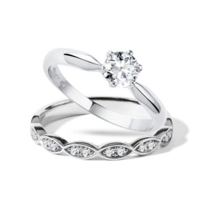 Elegantní snubní a zásnubní prsten v bílém zlatě KLENOTA
