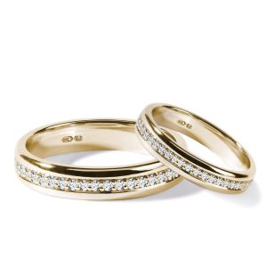Sada snubních diamantových prstenů eternity ze žlutého zlata KLENOTA