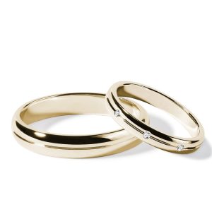 Sada snubních drážkových prstenů s diamanty ve žlutém zlatě KLENOTA